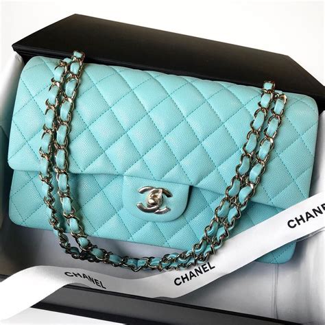 blue chanel bag with a flower on it|chanel bag blue color.